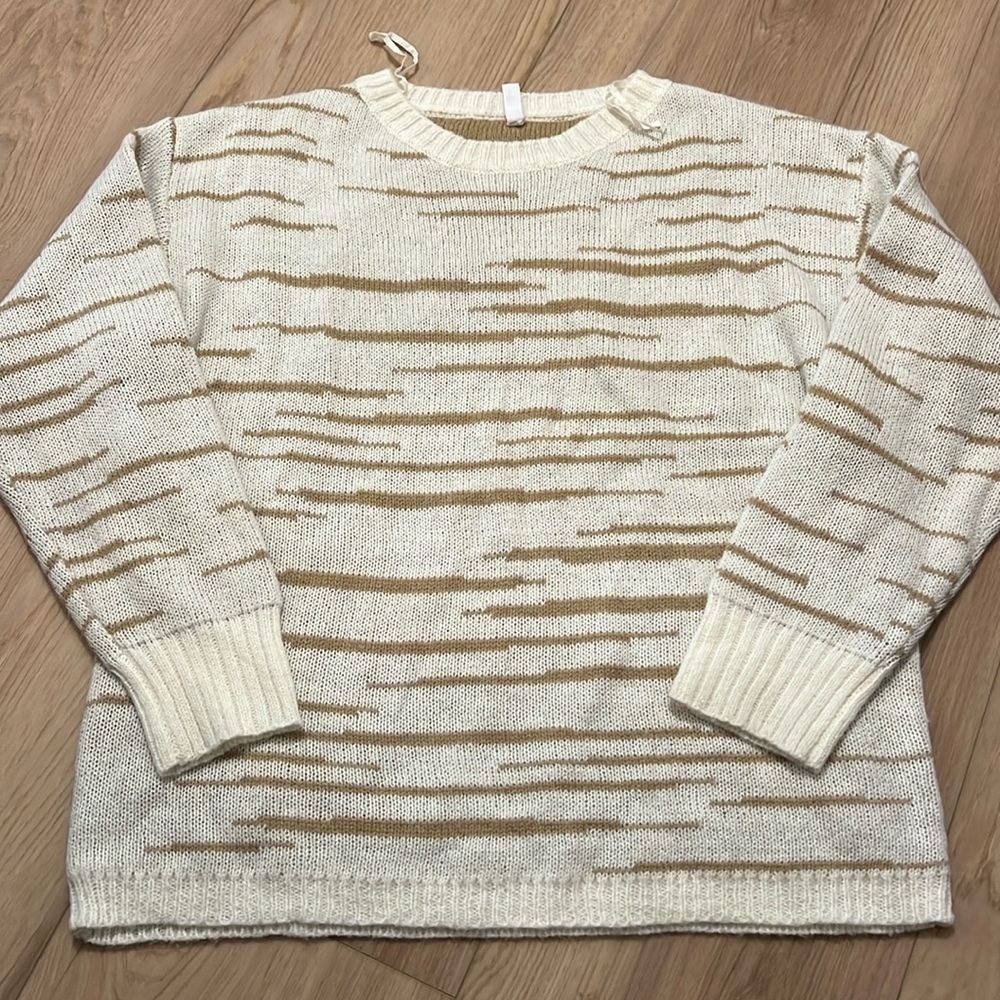 Boutique Sweater. New without tags. Never worn. Smoke free home